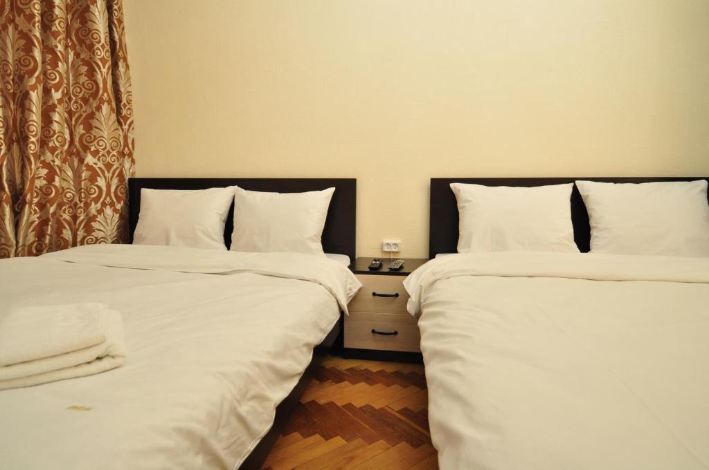 Status Guesthouse Київ Номер фото